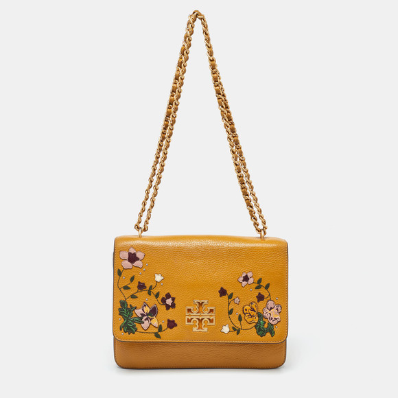 Tory Burch Handbags - TORY BURCH Mustard Leather Britten Floral Applique Flap Bag